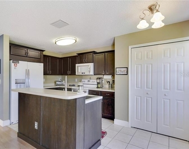 8008 Sutton Terrace Lane - Photo Thumbnail 2