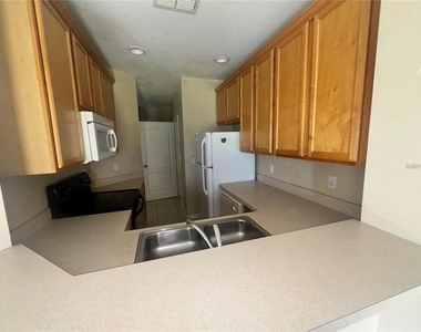 9448 Flowering Cottonwood Road - Photo Thumbnail 5
