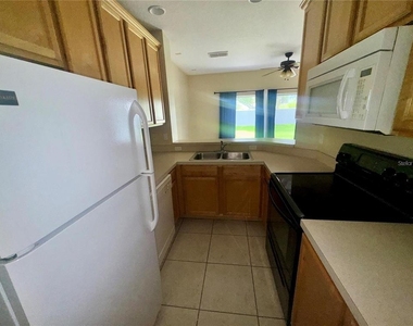 9448 Flowering Cottonwood Road - Photo Thumbnail 4
