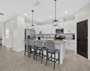 15522 Islandwalk Avenue - Photo Thumbnail 10