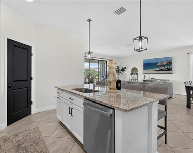15522 Islandwalk Avenue - Photo Thumbnail 12