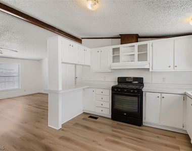6105 Berthelot Lane - Photo Thumbnail 4