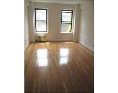 E 37th St - Photo Thumbnail 2