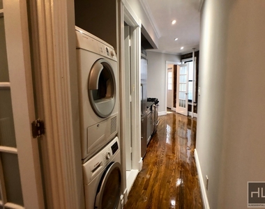 E 13th St. - Photo Thumbnail 5