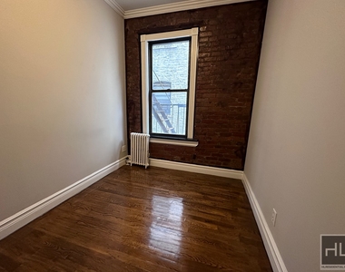 E 13th St. - Photo Thumbnail 1