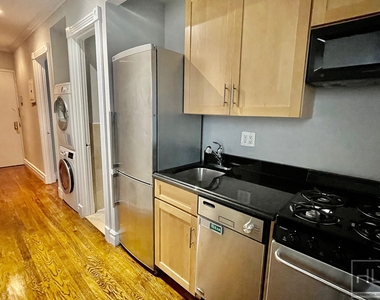 E 13th St. - Photo Thumbnail 2