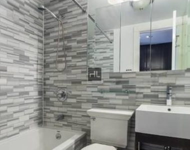 E 13th St. - Photo Thumbnail 4
