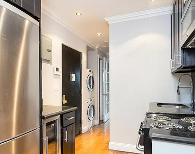 W 53rd St. - Photo Thumbnail 5