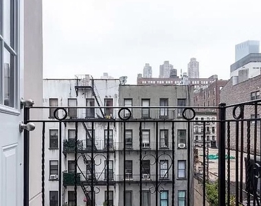 W 53rd St. - Photo Thumbnail 3