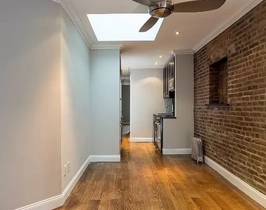 W 53rd St. - Photo Thumbnail 1