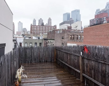 W 53rd St. - Photo Thumbnail 4