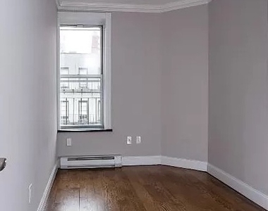 W 53rd St. - Photo Thumbnail 2