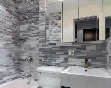W 53rd St. - Photo Thumbnail 5