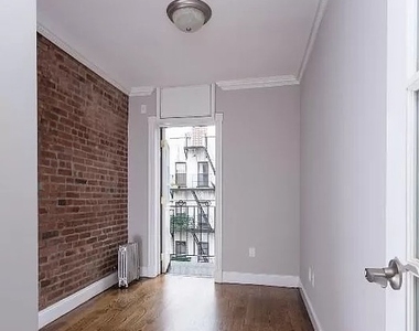 W 53rd St. - Photo Thumbnail 3