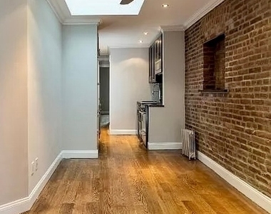W 53rd St. - Photo Thumbnail 3