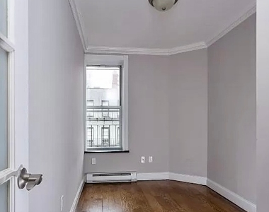 W 53rd St. - Photo Thumbnail 4