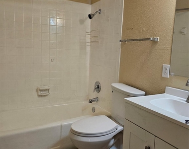 5604 Macarthur Drive - Photo Thumbnail 1