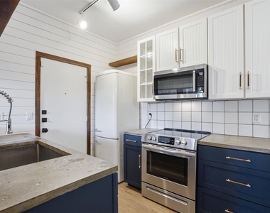 5616 Preston Oaks Road - Photo Thumbnail 2