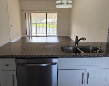 8341 Boca Glades Boulevard E - Photo Thumbnail 1