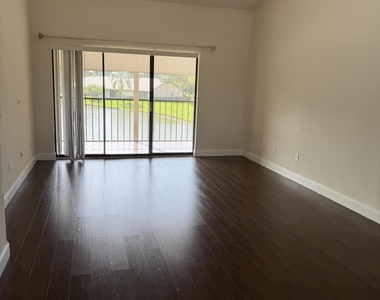 8341 Boca Glades Boulevard E - Photo Thumbnail 2