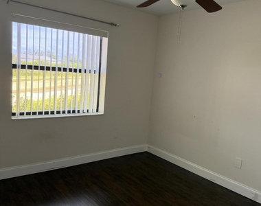 8341 Boca Glades Boulevard E - Photo Thumbnail 3