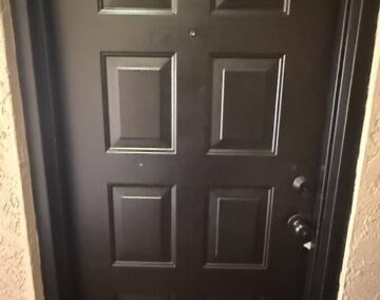 8741 Wiles Road - Photo Thumbnail 2