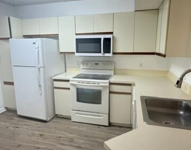8741 Wiles Road - Photo Thumbnail 9