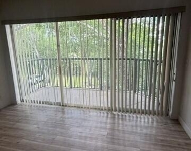 8741 Wiles Road - Photo Thumbnail 8