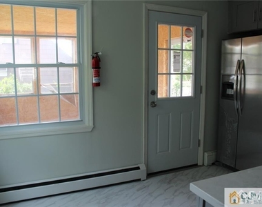 65 Washington Avenue - Photo Thumbnail 2