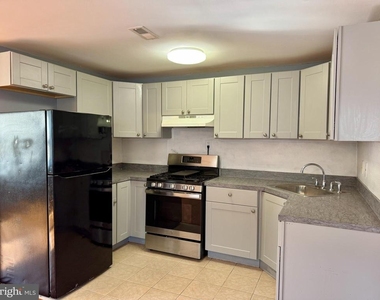 1323 E Upsal Street - Photo Thumbnail 6