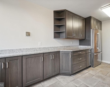 10401 Grosvenor Place - Photo Thumbnail 8