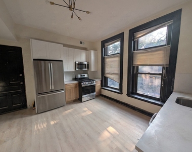 1481 W Erie Street - Photo Thumbnail 2