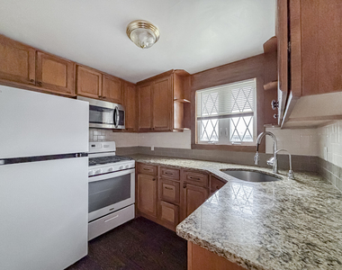 5156 W 63rd Place - Photo Thumbnail 2