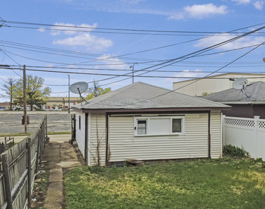 5156 W 63rd Place - Photo Thumbnail 1