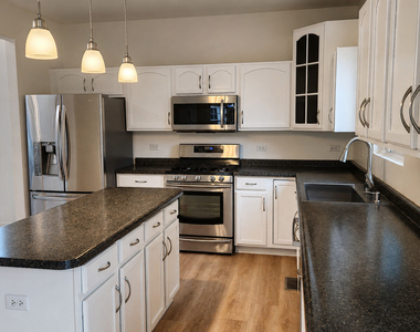 1523 Schumacher Drive W - Photo Thumbnail 2