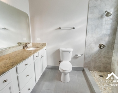 1437 E 65th Place - Photo Thumbnail 9