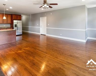 1437 E 65th Place - Photo Thumbnail 4