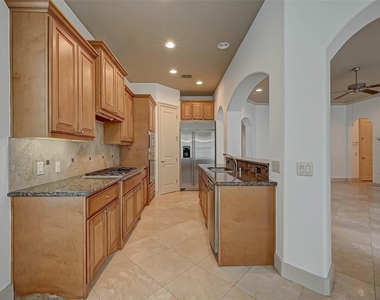 11207 St Laurent Lane - Photo Thumbnail 6