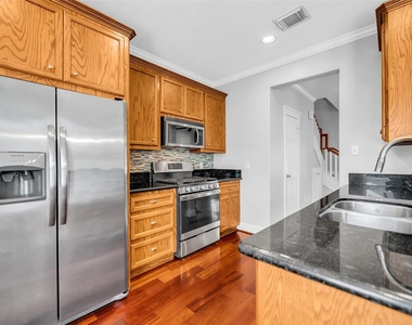 1029 W 15th 1/2 Street - Photo Thumbnail 6
