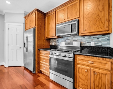 1029 W 15th 1/2 Street - Photo Thumbnail 8