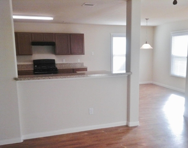 6205 Heffernan Street - Photo Thumbnail 2