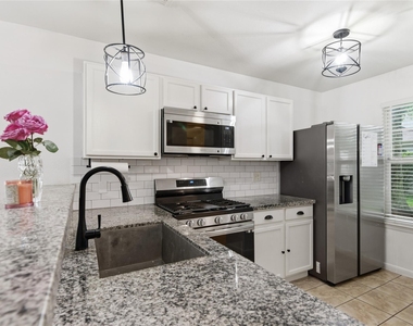 6136 Lone Prairie Way - Photo Thumbnail 2