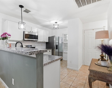 6136 Lone Prairie Way - Photo Thumbnail 3