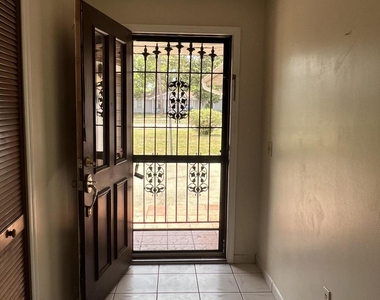 6485 Manila Drive - Photo Thumbnail 1