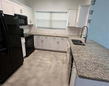 1215 E 29th Avenue - Photo Thumbnail 3