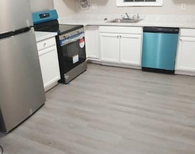 313 S West Street - Photo Thumbnail 2