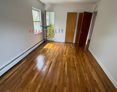 22-53 76th Street - Photo Thumbnail 4