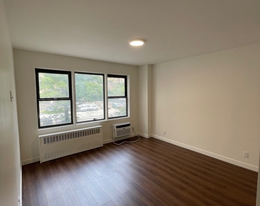 East 36 Street - Photo Thumbnail 5