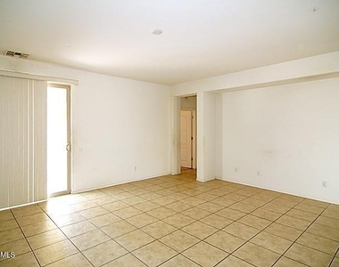 9237 W Milkweed Loop - Photo Thumbnail 2