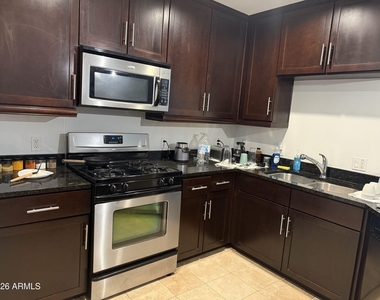945 E Playa Del Norte Drive - Photo Thumbnail 2